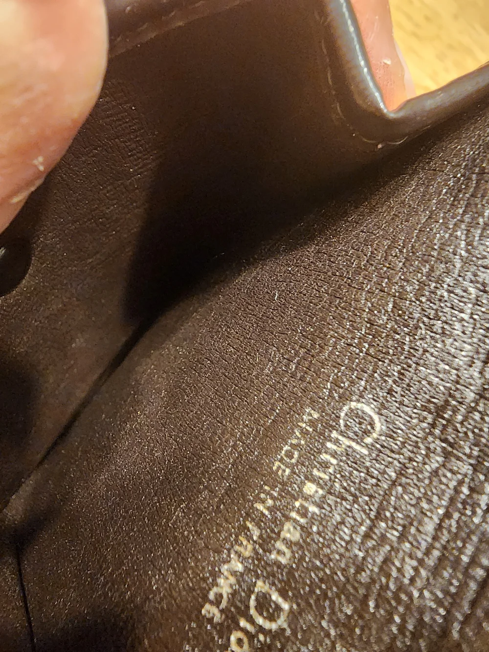 vintage Christian Dior coin purse features the iconic brown Trotter canvas mono